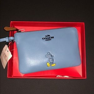Disney Coach wristlet. NWT. IN BOX!!